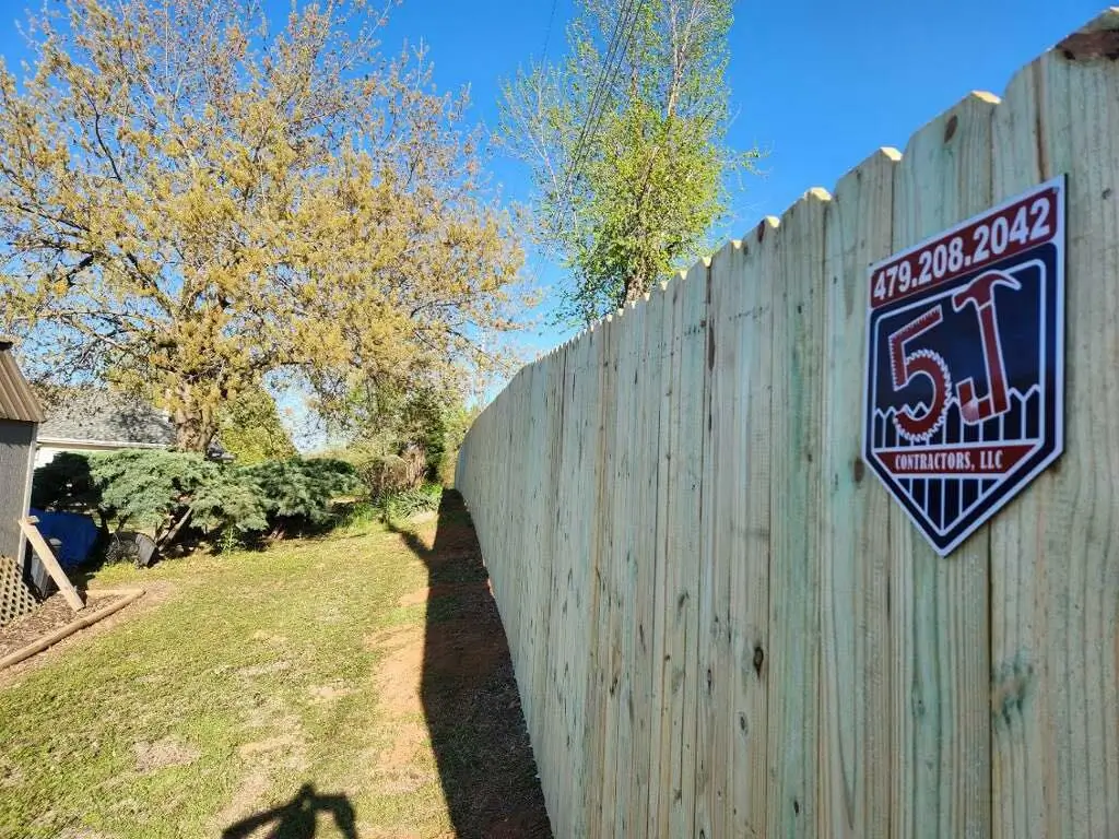 5J wooden fence with 5J sign